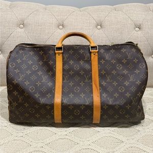 Preloved LV travel bag keepall 50 no strap